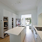 Flush fitting cabinetry in minimalist kitchen